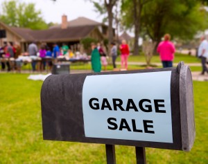 Garage sale in an american weekend on the yard green lawn